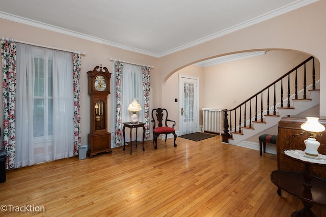 4929 Washington St, Downers Grove, IL 60515 - entrance foyer with hardwood / wood-style flooring, arched walkways, crown molding, and stairs