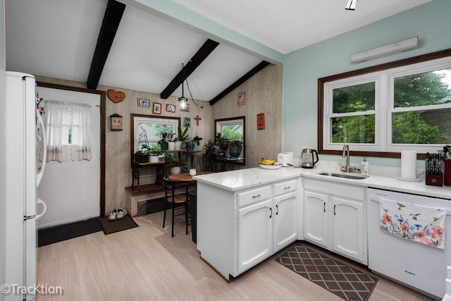 4929 Washington St, Downers Grove, IL 60515 - kitchen with white appliances, light wood finished floors, a peninsula, and healthy amount of natural light