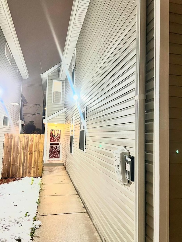 view of property exterior with fence