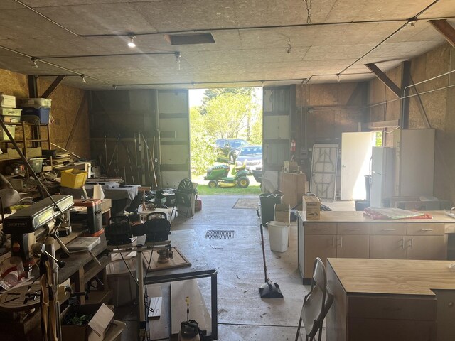2493 W Mud Creek Rd, Mount Morris, IL 61054 - misc room featuring concrete flooring and a garage