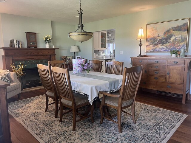 2493 W Mud Creek Rd, Mount Morris, IL 61054 - dining area with dark wood-style floors