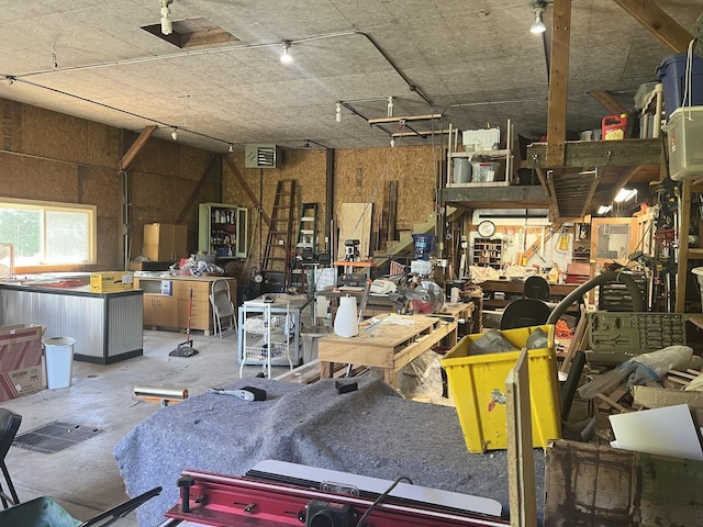 2493 W Mud Creek Rd, Mount Morris, IL 61054 - misc room with a workshop area and unfinished concrete flooring