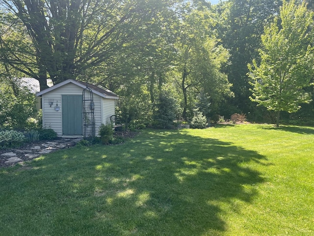 2493 W Mud Creek Rd, Mount Morris, IL 61054 - view of grassy yard with a storage shed and an outbuilding