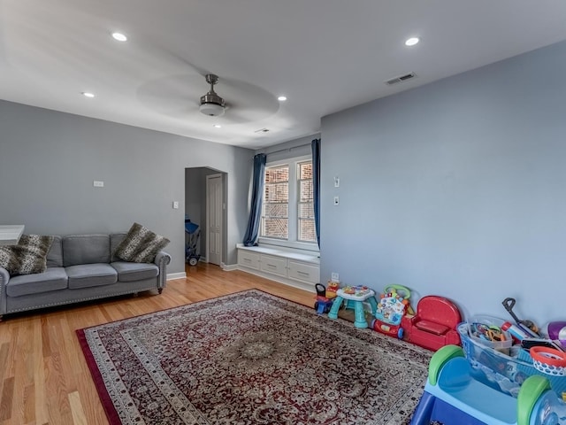 5717 N Kimball Ave Unit 2N, Chicago, IL 60659 - playroom with a ceiling fan, light wood-style floors, recessed lighting, and baseboards