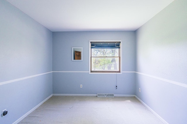 4182 Dawson Lake Rd, Poplar Grove, IL 61065 - spare room featuring light carpet and baseboards