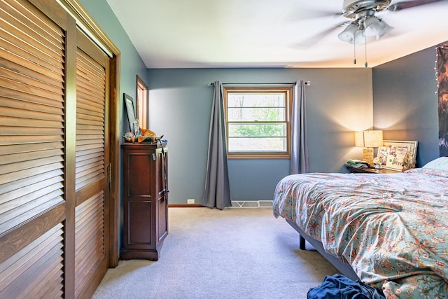 4182 Dawson Lake Rd, Poplar Grove, IL 61065 - bedroom featuring light carpet, baseboards, a ceiling fan, and a closet