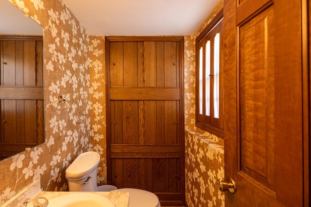 4182 Dawson Lake Rd, Poplar Grove, IL 61065 - bathroom with wallpapered walls, toilet, and plenty of natural light