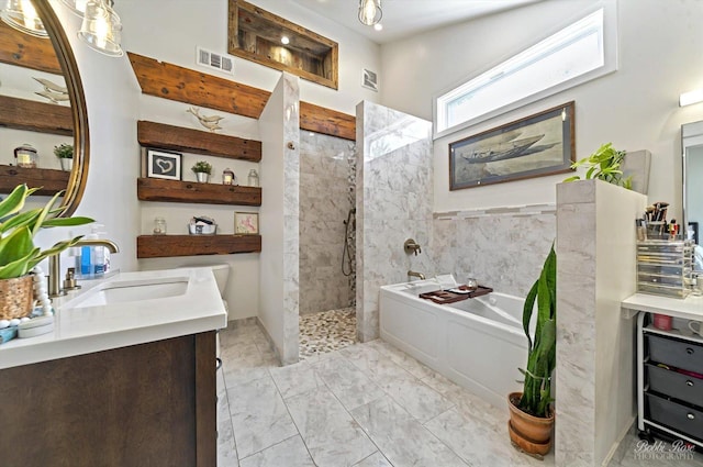 1224 S Mount Prospect Rd, Des Plaines, IL 60018 - bathroom featuring a garden tub, walk in shower, marble finish flooring, and double vanity