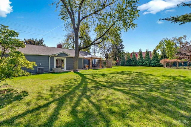 1224 S Mount Prospect Rd, Des Plaines, IL 60018 - view of grassy yard featuring a gazebo and central AC