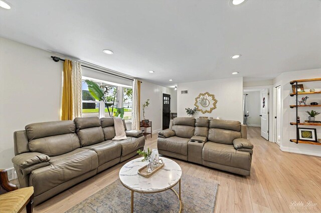 1224 S Mount Prospect Rd, Des Plaines, IL 60018 - living room with light wood-type flooring, recessed lighting, and baseboards