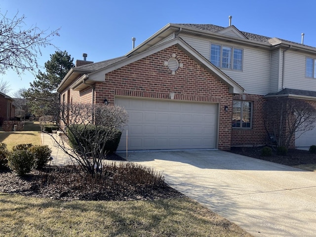 9423 Caledonia Dr, Tinley Park, IL 60487 - view of front of house with brick siding, driveway, a garage, and a chimney