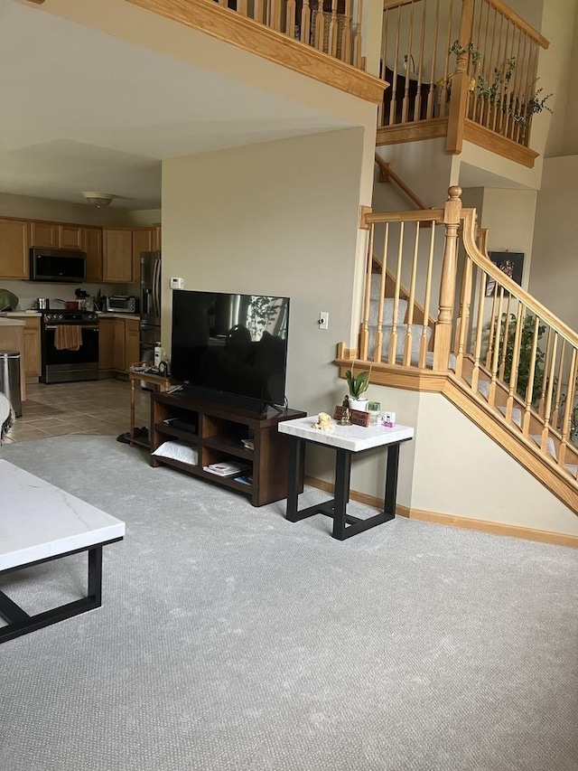 9423 Caledonia Dr, Tinley Park, IL 60487 - living area with light carpet, stairway, and baseboards