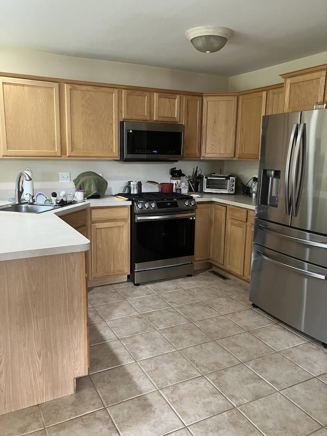 9423 Caledonia Dr, Tinley Park, IL 60487 - kitchen with appliances with stainless steel finishes, light countertops, light tile patterned floors, and a sink