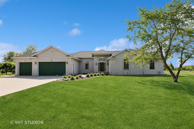 23803 E 3100 N Rd, Dwight, IL 60420 - view of front facade with an attached garage, a front lawn, concrete driveway, and brick siding