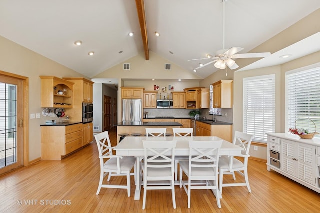 23803 E 3100 N Rd, Dwight, IL 60420 - kitchen with stainless steel appliances, open shelves, a kitchen island, a sink, and decorative backsplash