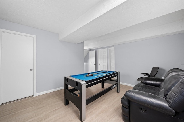 296 E Crest Ave, Bensenville, IL 60106 - playroom featuring billiards, light wood-style flooring, baseboards, and a textured ceiling
