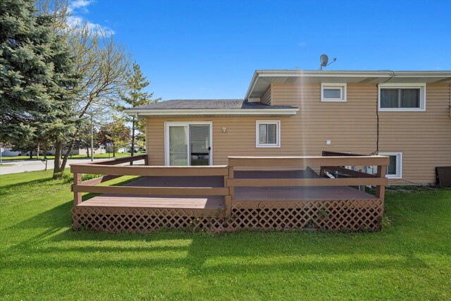 296 E Crest Ave, Bensenville, IL 60106 - rear view of house with a lawn and a deck