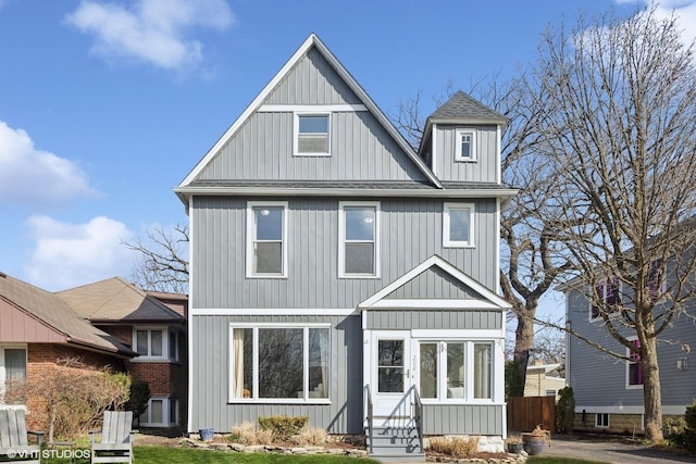 208 Fairbank Rd, Riverside, IL 60546 - view of front of home featuring entry steps, board and batten siding, and fence