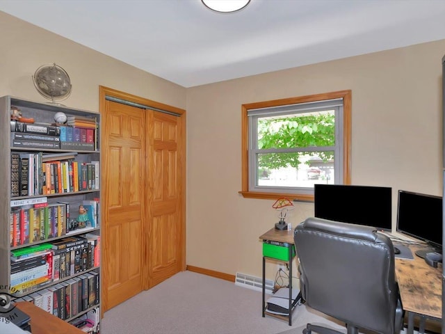 office area featuring carpet flooring and baseboards