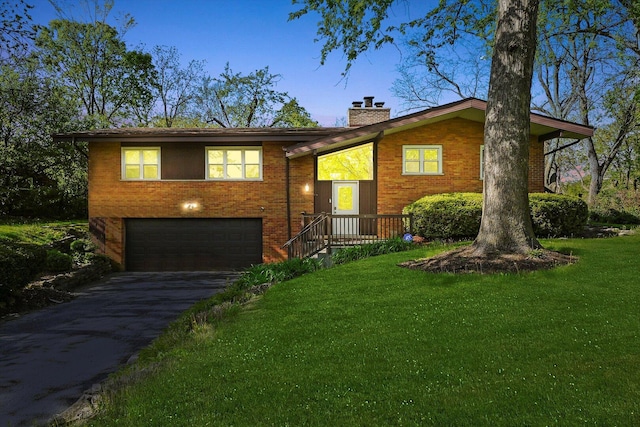 2747 Perry Rd, Flossmoor, IL 60422 - view of front of house with an attached garage, a chimney, asphalt driveway, and a front lawn