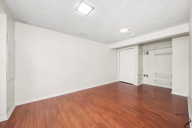 2747 Perry Rd, Flossmoor, IL 60422 - unfurnished bedroom with wood finished floors, a closet, and baseboards