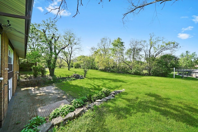 2747 Perry Rd, Flossmoor, IL 60422 - view of grassy yard featuring a patio area