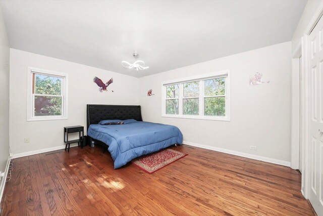 2747 Perry Rd, Flossmoor, IL 60422 - bedroom with wood finished floors and baseboards