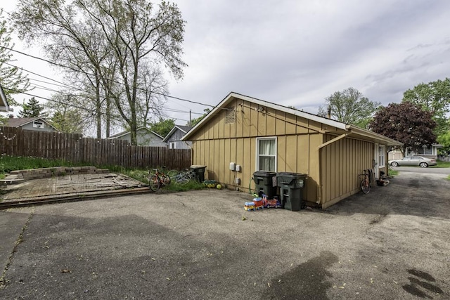 19451 W Hoag Ct, Mundelein, IL 60060 - view of home's exterior with fence and board and batten siding