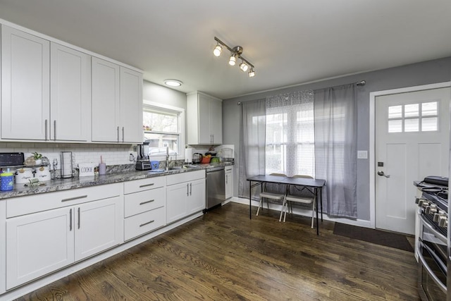 19451 W Hoag Ct, Mundelein, IL 60060 - kitchen with stainless steel appliances, light stone countertops, decorative backsplash, dark wood-type flooring, and white cabinets