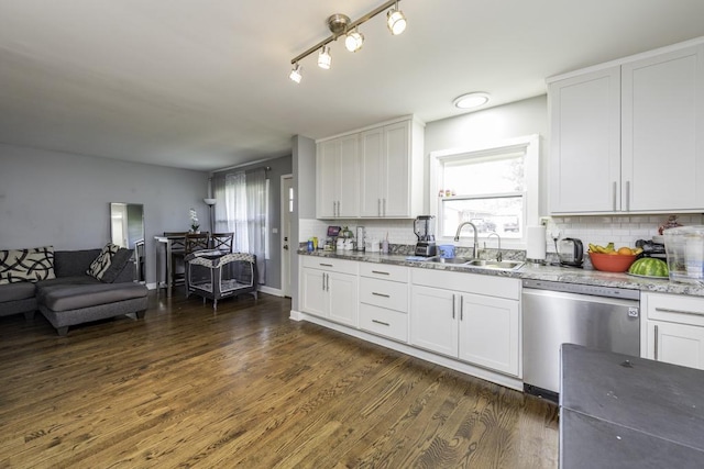 19451 W Hoag Ct, Mundelein, IL 60060 - kitchen featuring stainless steel dishwasher, healthy amount of natural light, a sink, and backsplash