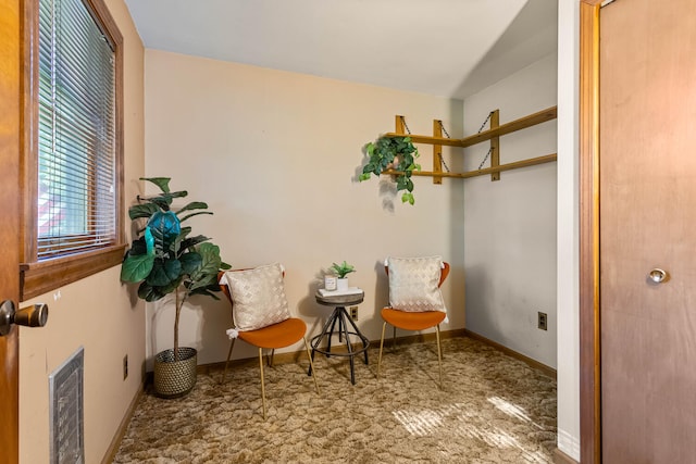 living area with baseboards