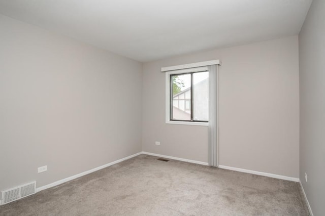 430 Brandy Dr Unit C, Crystal Lake, IL 60014 - carpeted spare room featuring baseboards