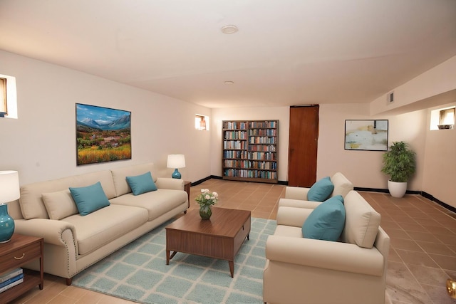 living room featuring baseboards