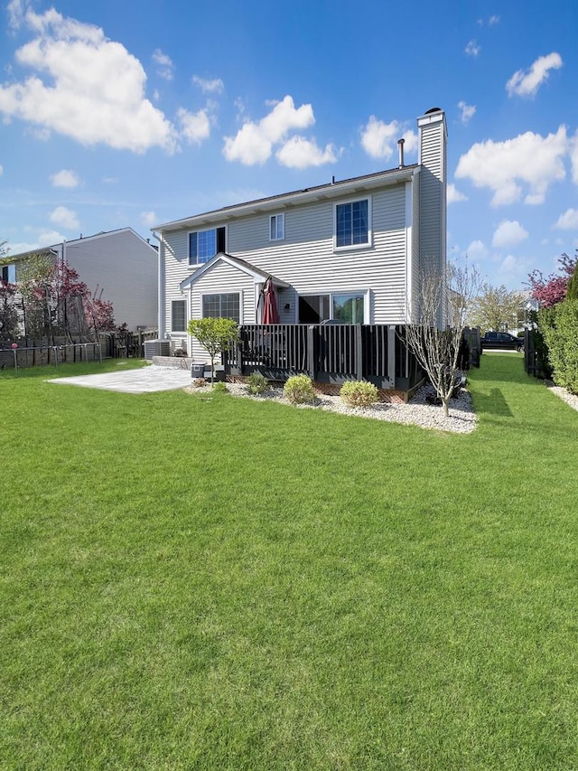 127 Bay View Ln, Grayslake, IL 60030 - back of house with a patio area and a chimney
