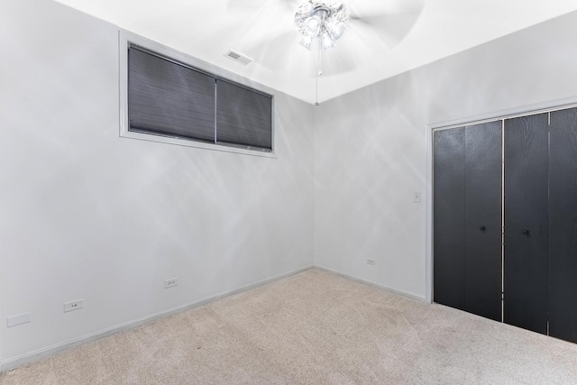 1107 S Independence Blvd Unit 1, Chicago, IL 60624 - unfurnished bedroom with carpet floors, a closet, baseboards, and a ceiling fan