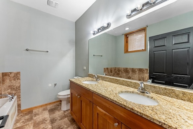 1107 S Independence Blvd Unit 1, Chicago, IL 60624 - full bath featuring toilet, a bath, baseboards, and double vanity