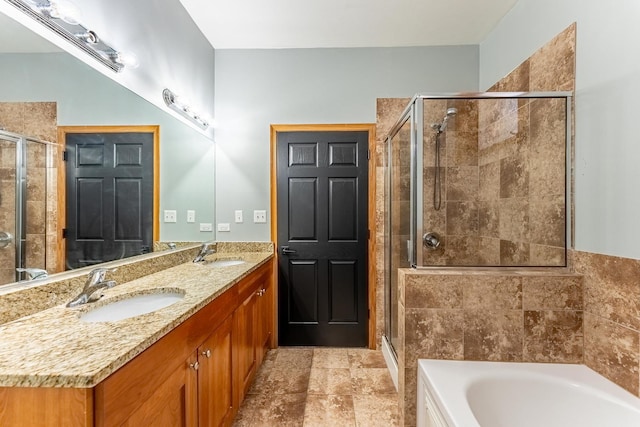 1107 S Independence Blvd Unit 1, Chicago, IL 60624 - full bathroom with a shower stall, a garden tub, and double vanity