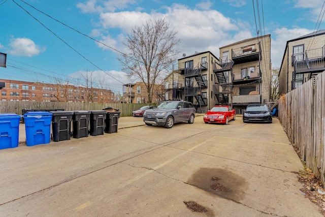 1107 S Independence Blvd Unit 1, Chicago, IL 60624 - view of car parking with fence