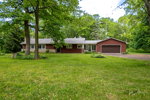3760 Business 20th Rd, Freeport, IL 61032 - single story home with an attached garage, asphalt driveway, and a front yard
