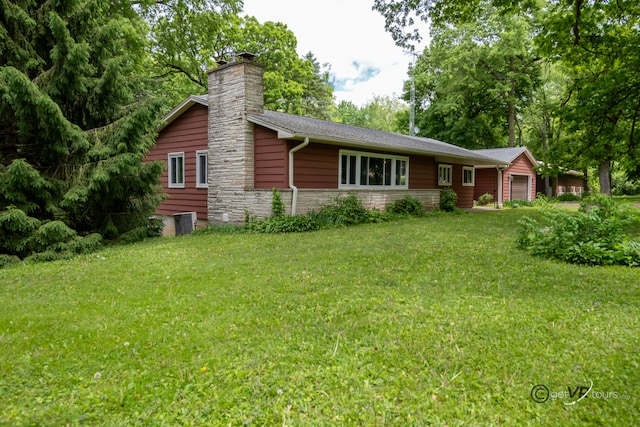 3760 Business 20th Rd, Freeport, IL 61032 - ranch-style home featuring a garage, a front lawn, a chimney, and stone siding