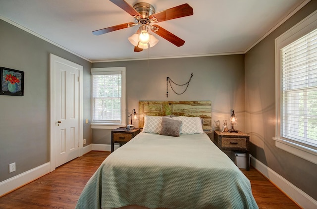 115 S Calumet Ave, Aurora, IL 60506 - bedroom featuring wood finished floors, baseboards, crown molding, and a ceiling fan