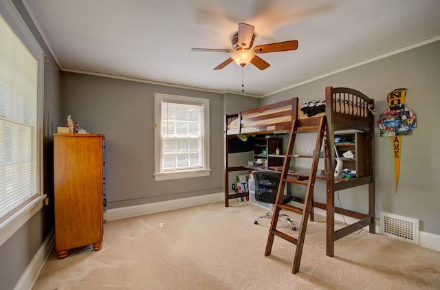 115 S Calumet Ave, Aurora, IL 60506 - carpeted bedroom featuring ornamental molding, a desk, baseboards, and ceiling fan