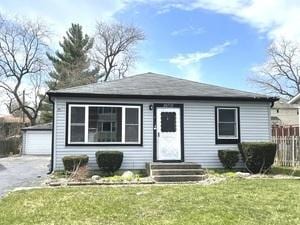 20772 N Elizabeth Ave, Prairie View, IL 60069 - bungalow-style house featuring entry steps, an outdoor structure, and a detached garage