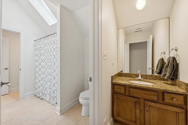 8250 Steepleside Dr, Burr Ridge, IL 60527 - full bathroom with a skylight, vanity, toilet, lofted ceiling, and tile patterned flooring