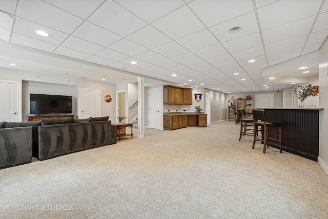 8250 Steepleside Dr, Burr Ridge, IL 60527 - living area with bar area, light carpet, a drop ceiling, baseboards, and stairway