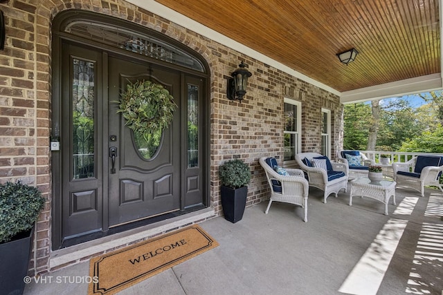 8250 Steepleside Dr, Burr Ridge, IL 60527 - view of exterior entry with covered porch and brick siding