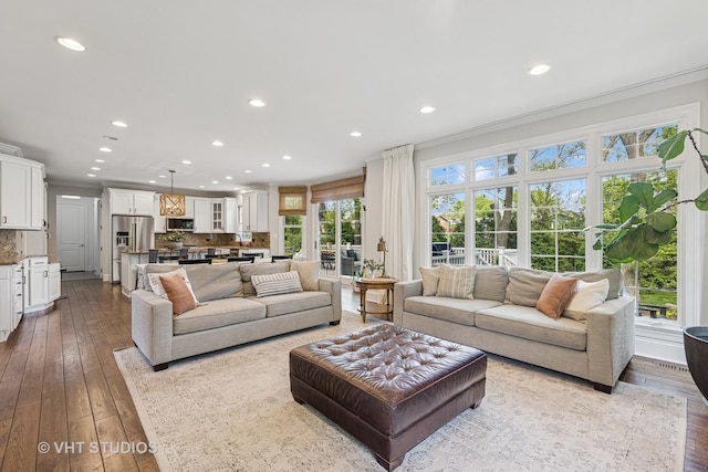 8250 Steepleside Dr, Burr Ridge, IL 60527 - living room with recessed lighting, crown molding, and wood-type flooring