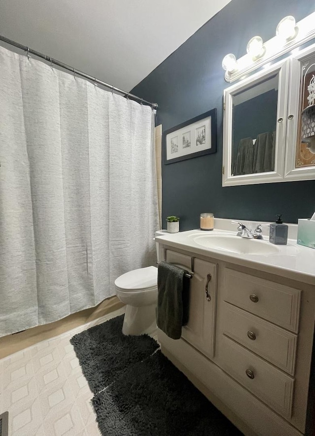 18269 W Woodland Ter, Gurnee, IL 60031 - bathroom featuring toilet, vanity, and curtained shower