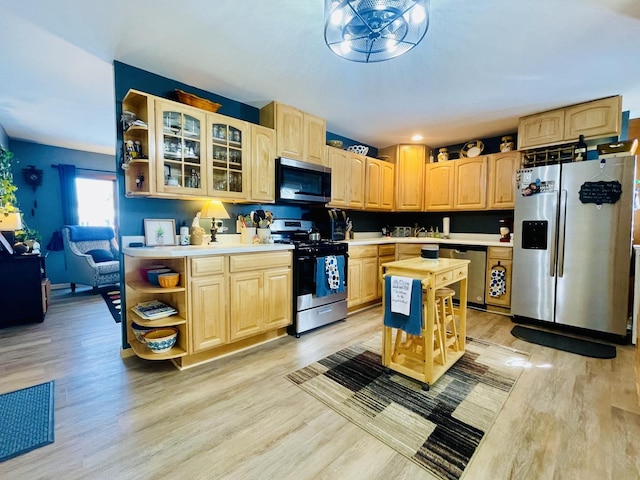 18269 W Woodland Ter, Gurnee, IL 60031 - kitchen with appliances with stainless steel finishes, open shelves, light brown cabinetry, and light countertops