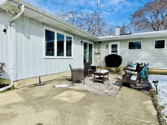 18269 W Woodland Ter, Gurnee, IL 60031 - back of house with a patio area, a chimney, and an outdoor hangout area